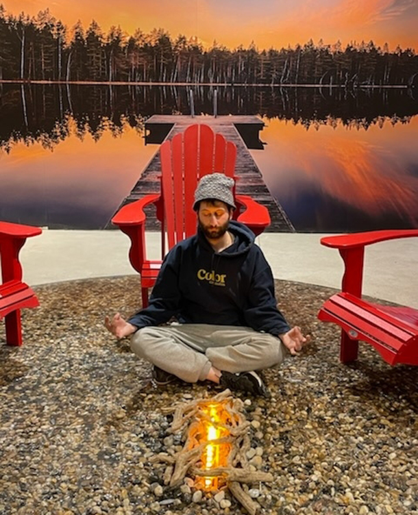 Enjoying a zen moment by the faux fire found in the Niagara Falls Stok'd dispensary.